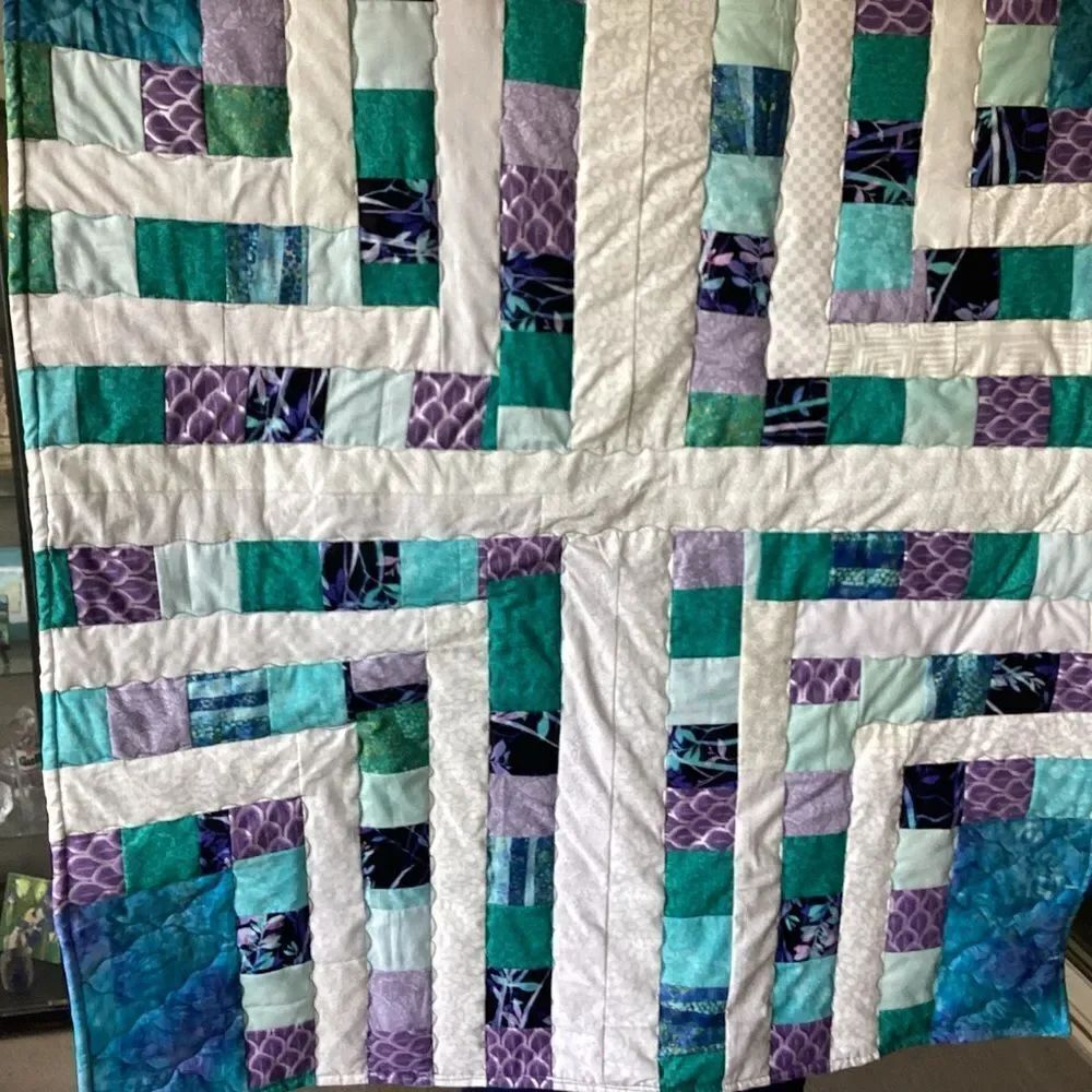 NWT. Hand Crafted Quilt of Blues, Purples and Turquoises